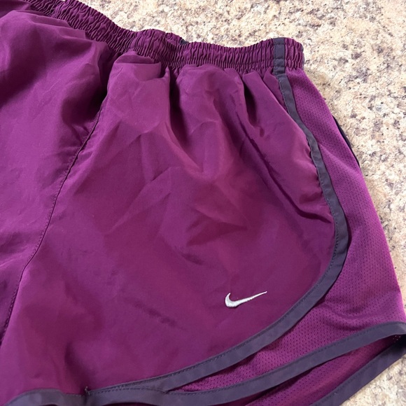 Nike Women's plum Purple Running Shorts - Picture 1 of 8